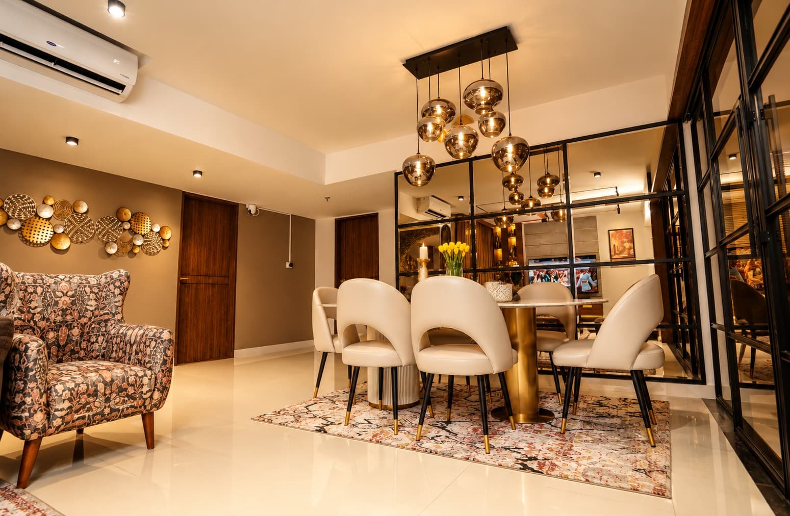 Dining table and black-framed glass partition at Skywalk TC One