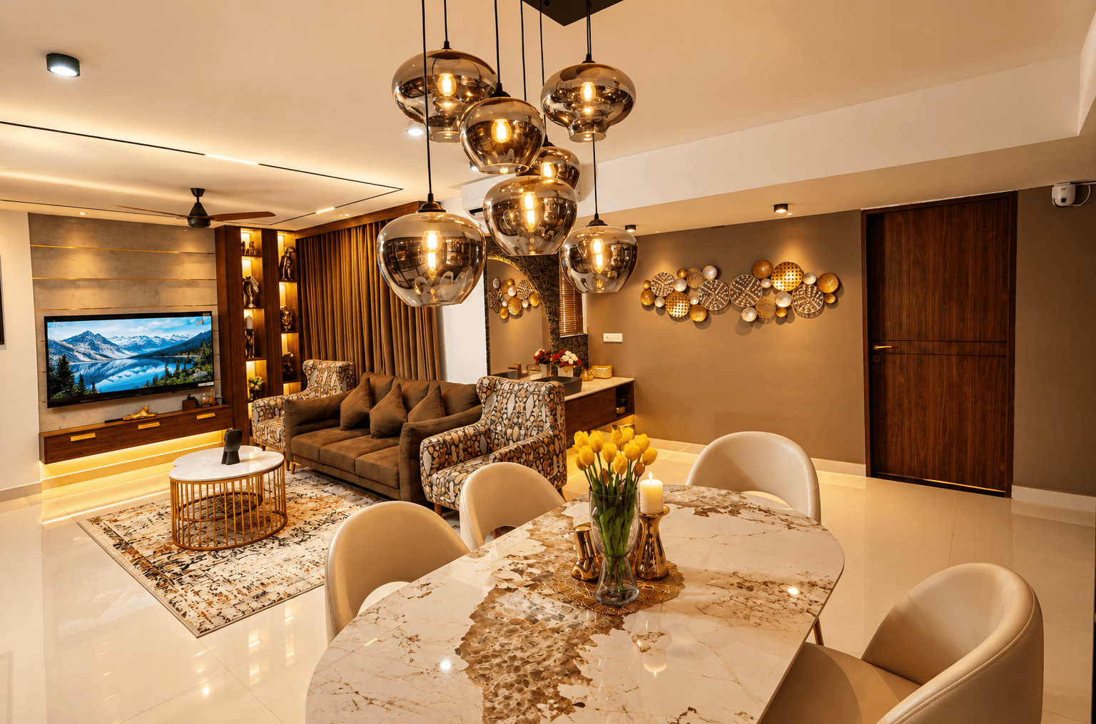 Wide view across the living and dining areas at Skywalk TC One, showing the seating, dining table and warm pendant lighting