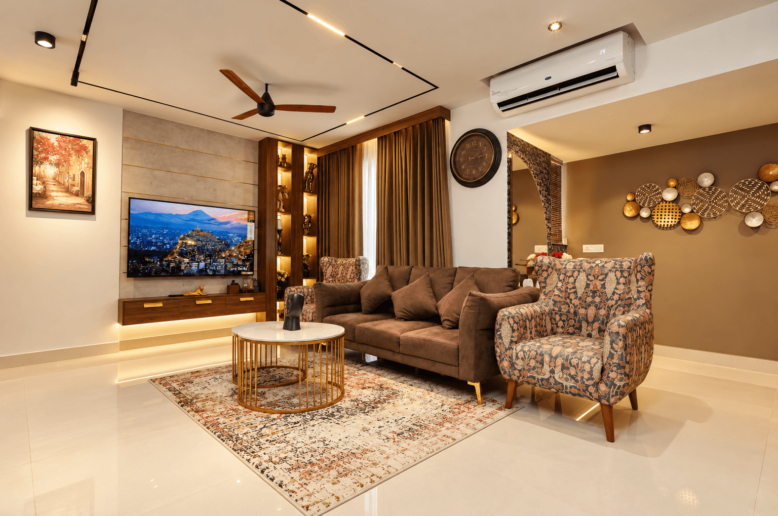 Living room at Skywalk TC One with brown seating, patterned accent chairs and warm layered lighting
